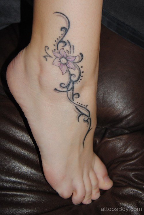 Small Black & White Flower Ankle Tattoo | Ankle tattoo designs, Flower  tattoo on ankle, Ankle tattoos for women