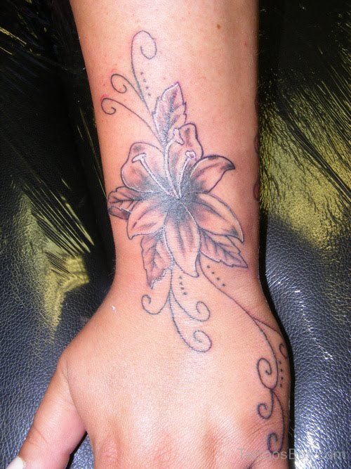 Lily Flower Tattoo On Hand Tattoo Designs, Tattoo Pictures