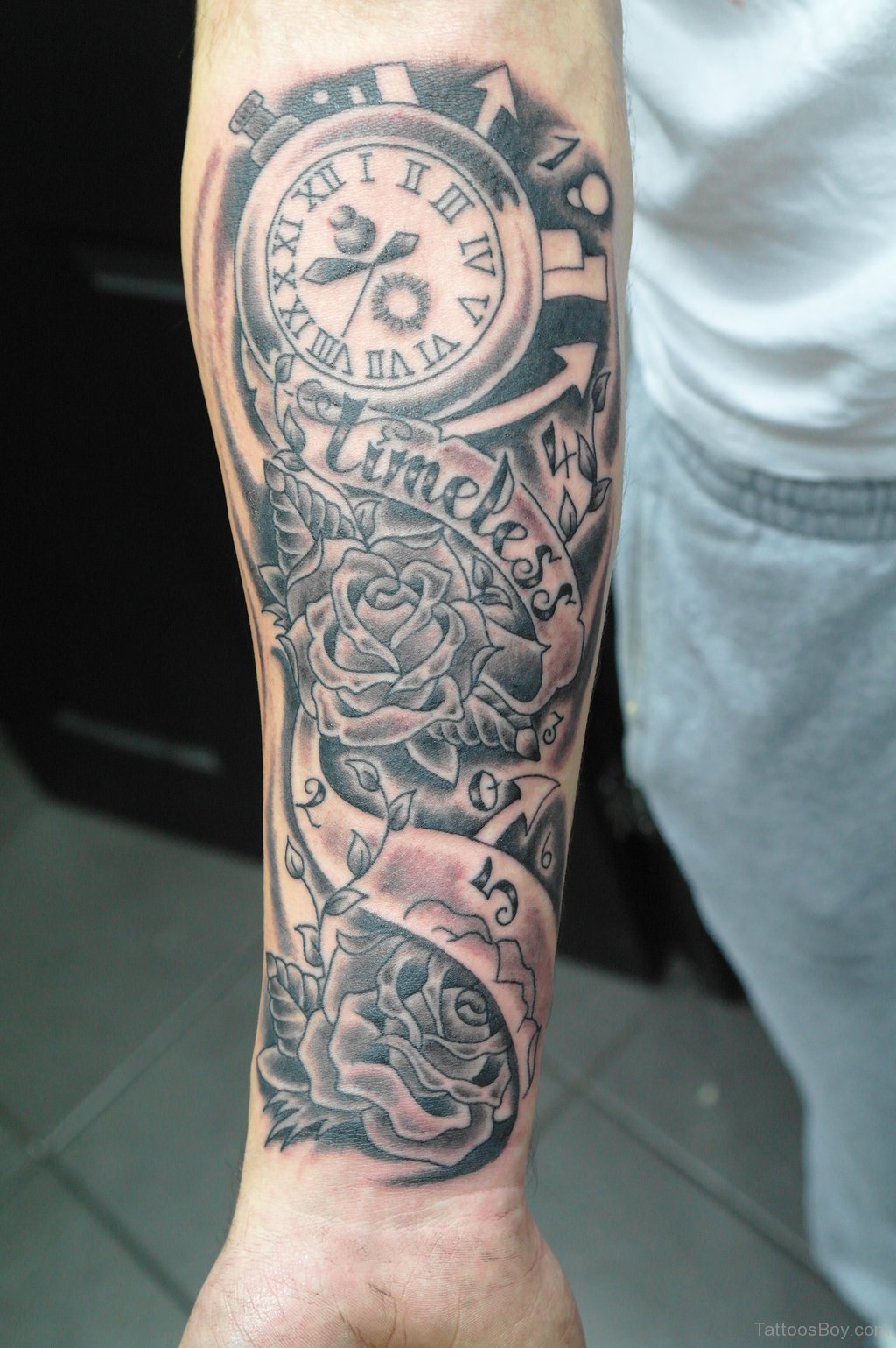 181 Tattooz Studio - Clock Tattoo with geometrical shapes outside on forearm,  not exactly on forearm but the position is unique or not very easy to inked  and you can see the