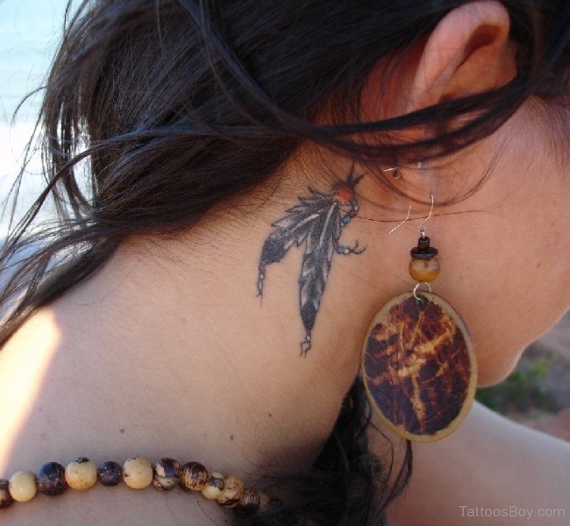 owl feather tattoo behind ear